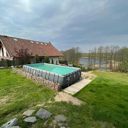 Дом отдыха Dom Na Wynajem Mazury Dom Na Wysokim Brzegu Nowe Bagienice